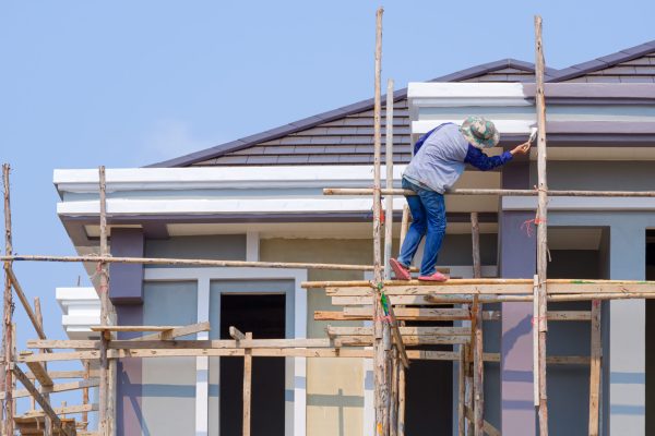 painter-on-wooden-scaffolding-is-painting-roof-eav-2026-01-09-00-30-53-utc